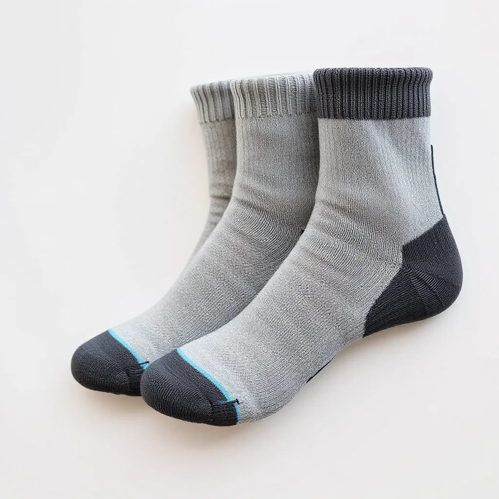 Three pairs of grip socks arranged neatly, showing non-slip textured soles for traction